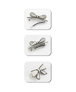 Kleine Patentspange mit Schleife cremedetail