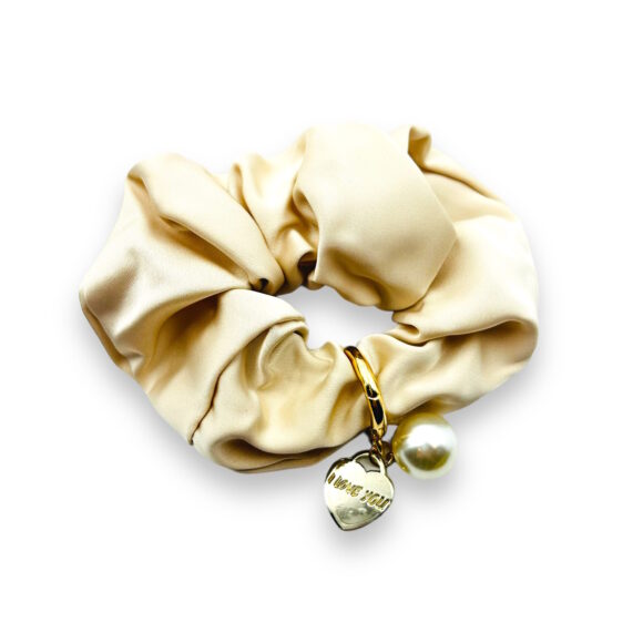 goldenes Haarnetz mit " i love you" Schild