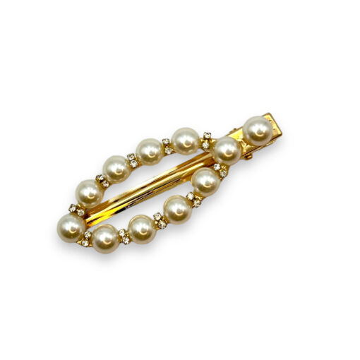 ovale goldene Haarspange mit einer Reihe Perlen
